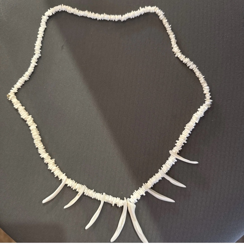 White Beaded Necklace with Claw Accents